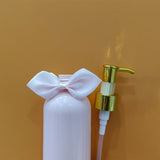 1/2 piezas 250ml Botella vacía de tipo prensa rosa con lazo, Detergente para ropa Gel de ducha Champú Loción Acondicionador Botella recargable dividida, Decoración del hogar