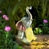 1 pieza de luz de jardín de elefante XXOASIS con energía solar, estatua de resina con orejas y trompa rojas, IP44, resistente al agua, para exteriores, decoración de paisajes, jardines, patios, jardines - Ideal para regalos de cumpleaños, Día de San Vale