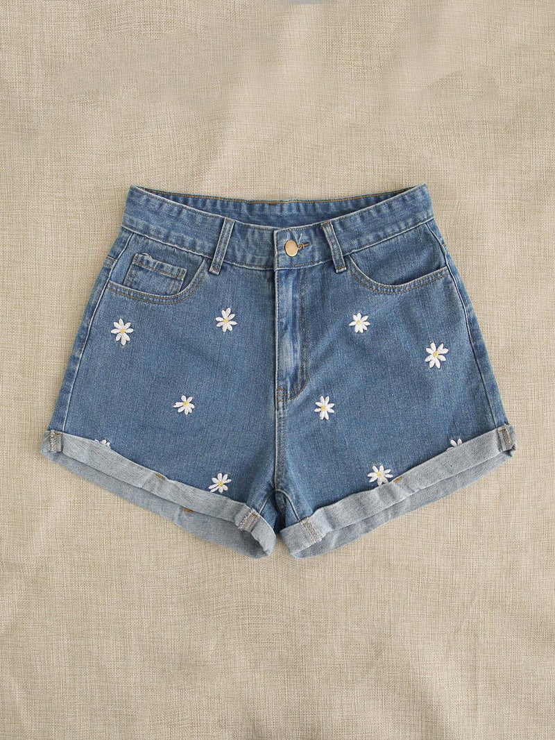 Shorts en mezclilla con bordado floral