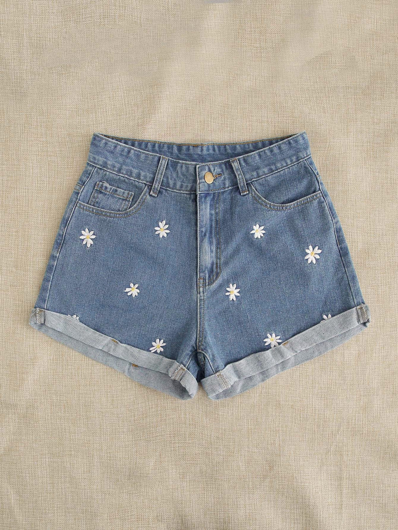 Shorts en mezclilla con bordado floral