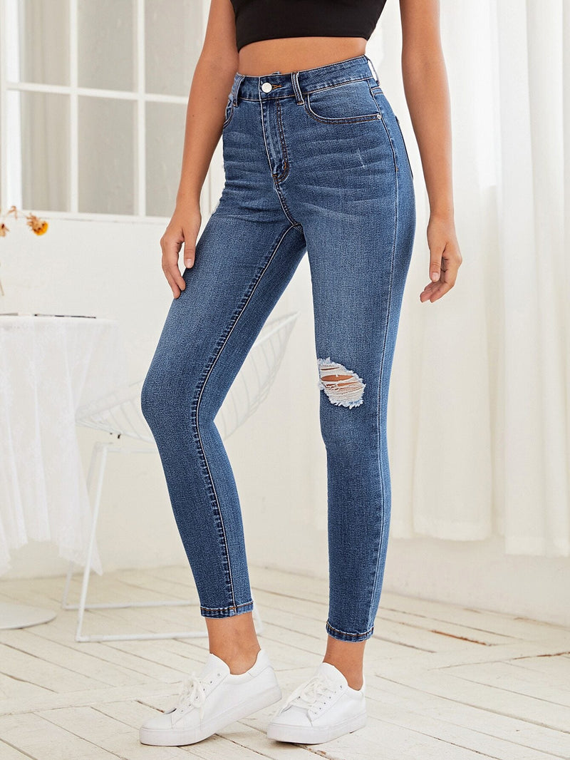 Essnce Jeans ajustados con diseno roto