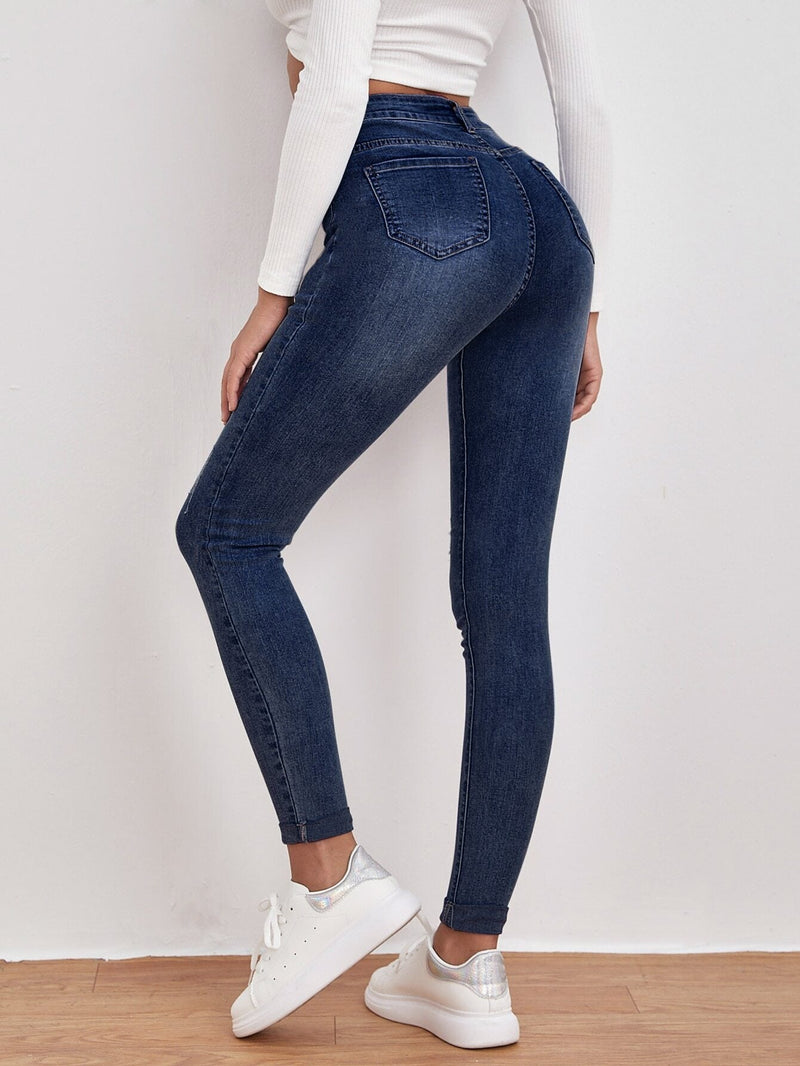 Frenchy Jeans ajustados de talle alto con diseno roto