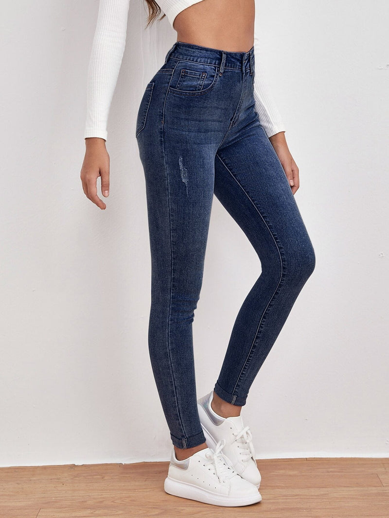 Frenchy Jeans ajustados de talle alto con diseno roto