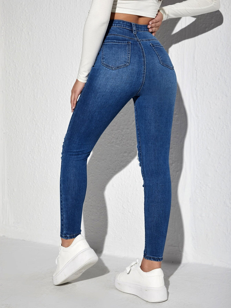 Essnce Jeans ajustados con diseno de desgarro