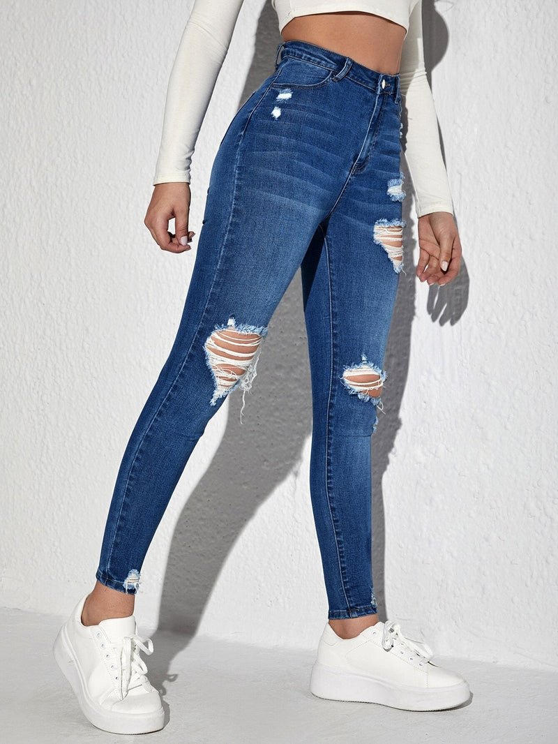 Essnce Jeans ajustados con diseno de desgarro