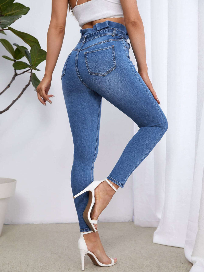 Essnce Jeans ajustados de talle alto con cinturon