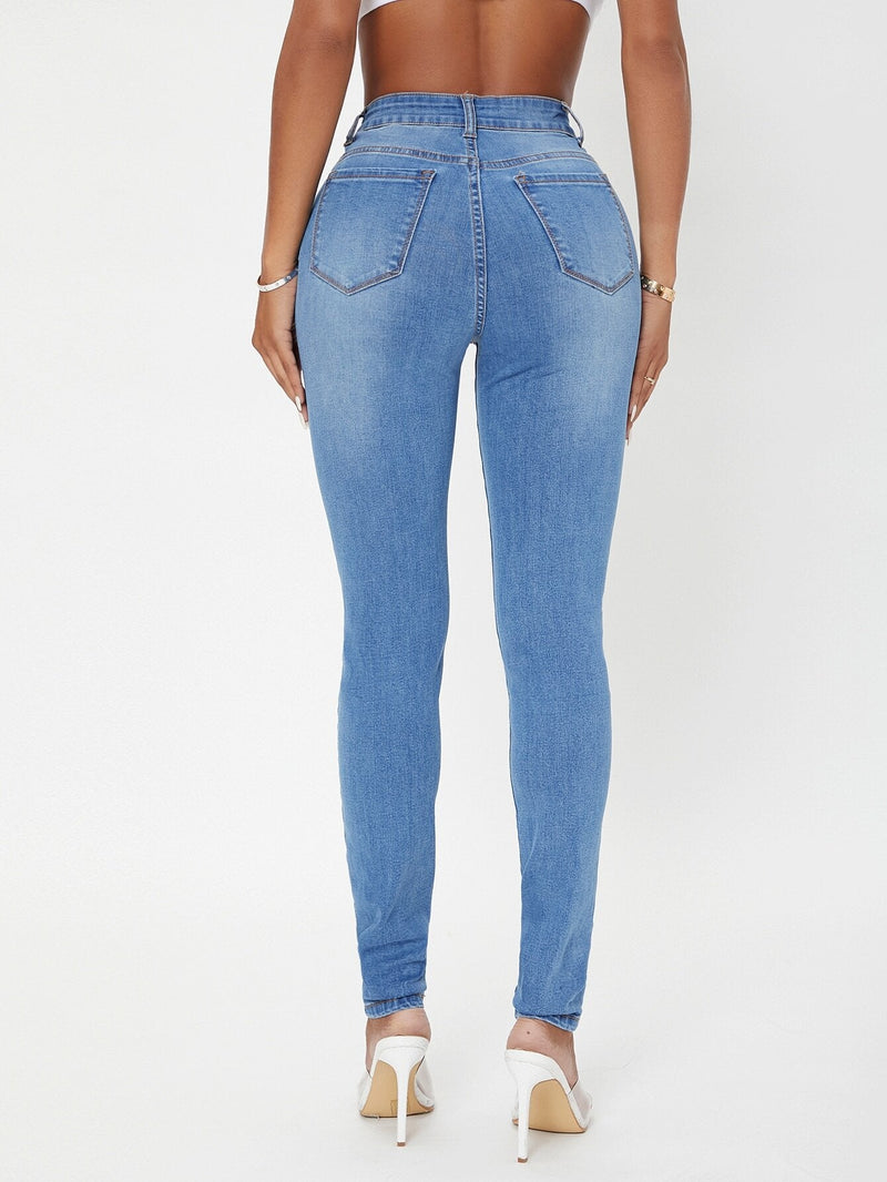 SXY Jeans ajustados de talle alto cremallera