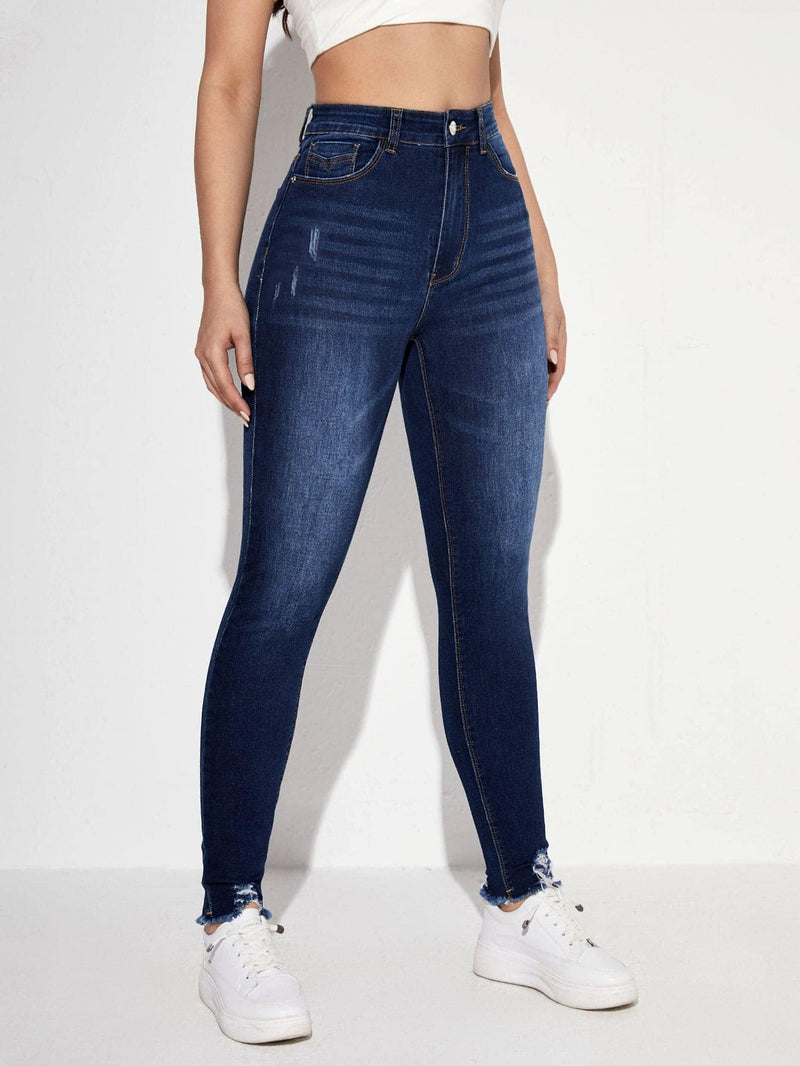 Essnce Jeans ajustados desgarro