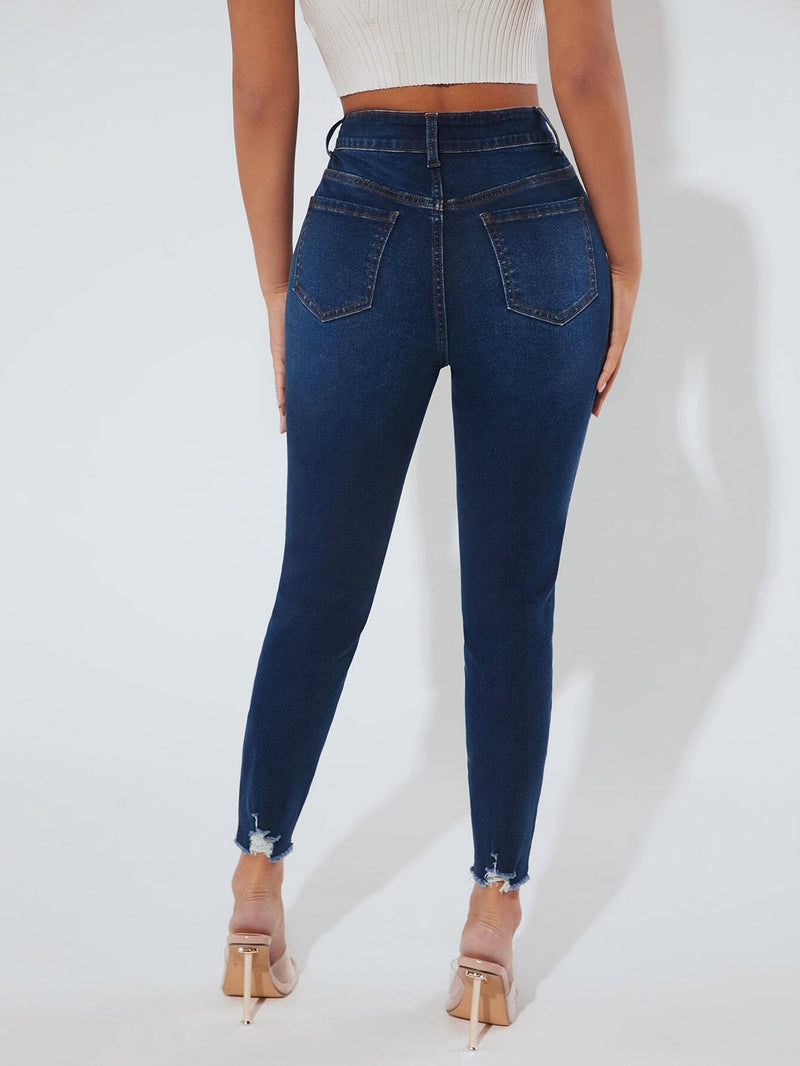 PETITE Jeans ajustados de talle alto desgarro bajo crudo