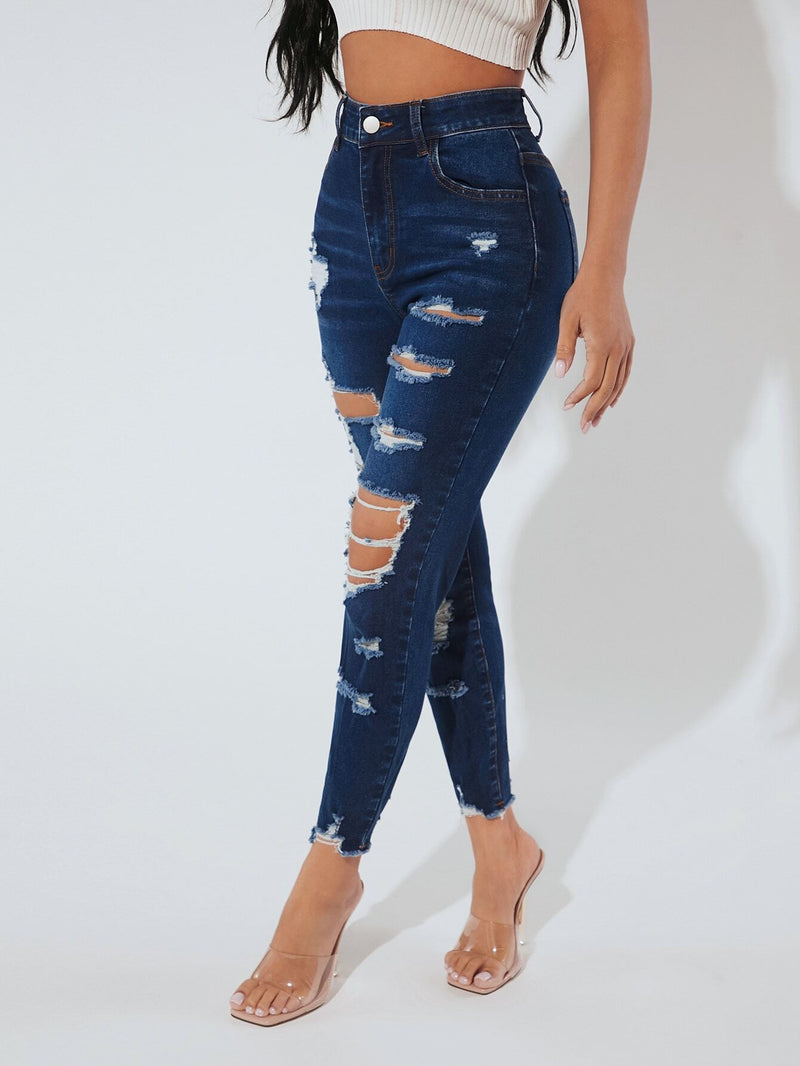 PETITE Jeans ajustados de talle alto desgarro bajo crudo