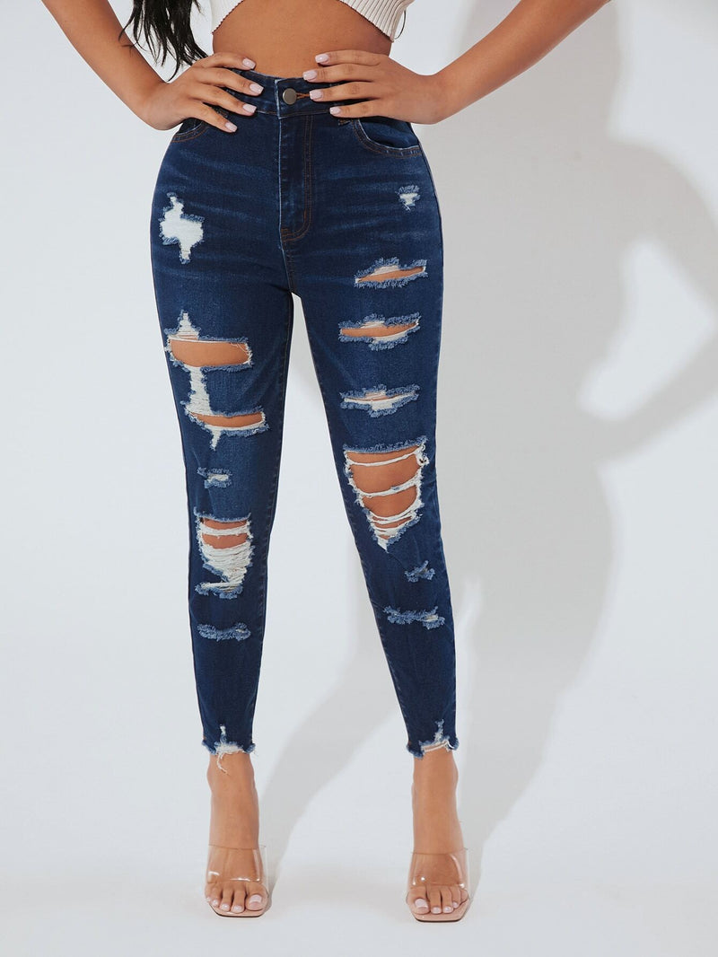 PETITE Jeans ajustados de talle alto desgarro bajo crudo