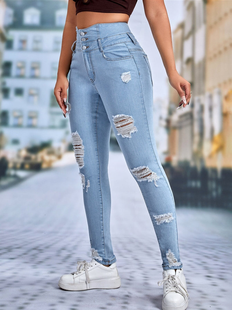 Essnce Jeans ajustados desgarro de talle alto