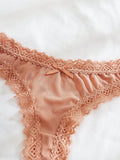 3 piezas Tanga con encaje en contraste con lazo delantero
