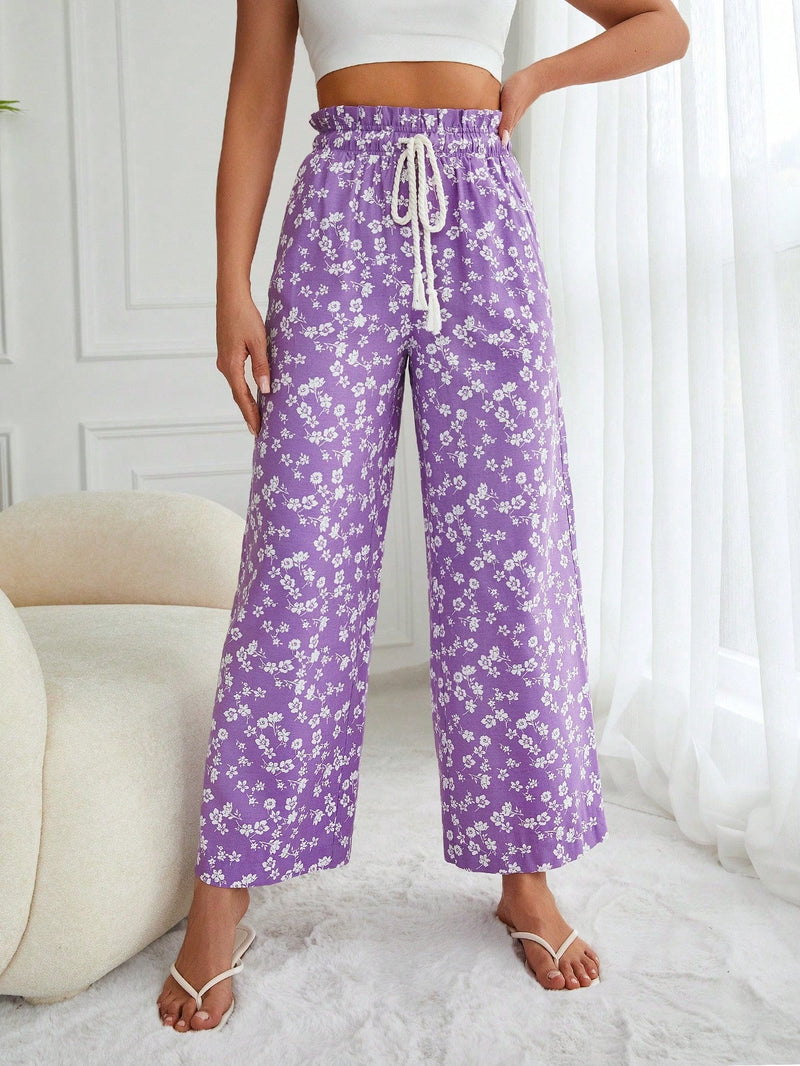 Pantalones largos con cintura con cordon y estampado floral