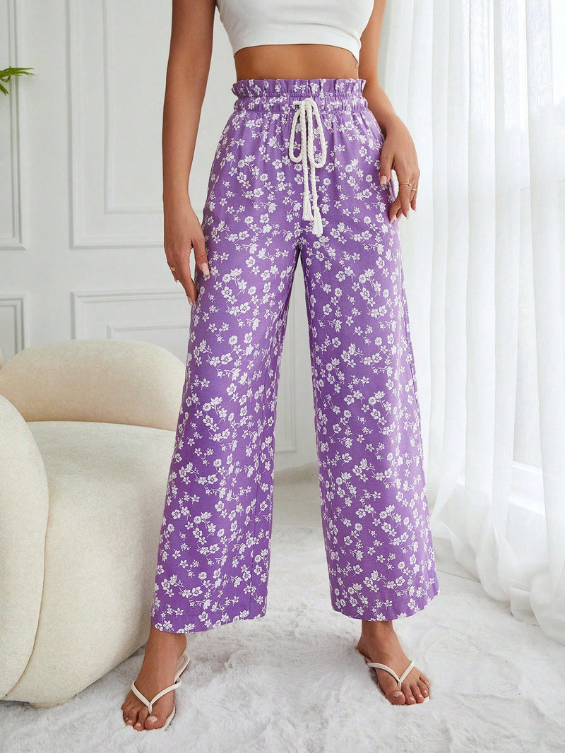 Pantalones largos con cintura con cordon y estampado floral