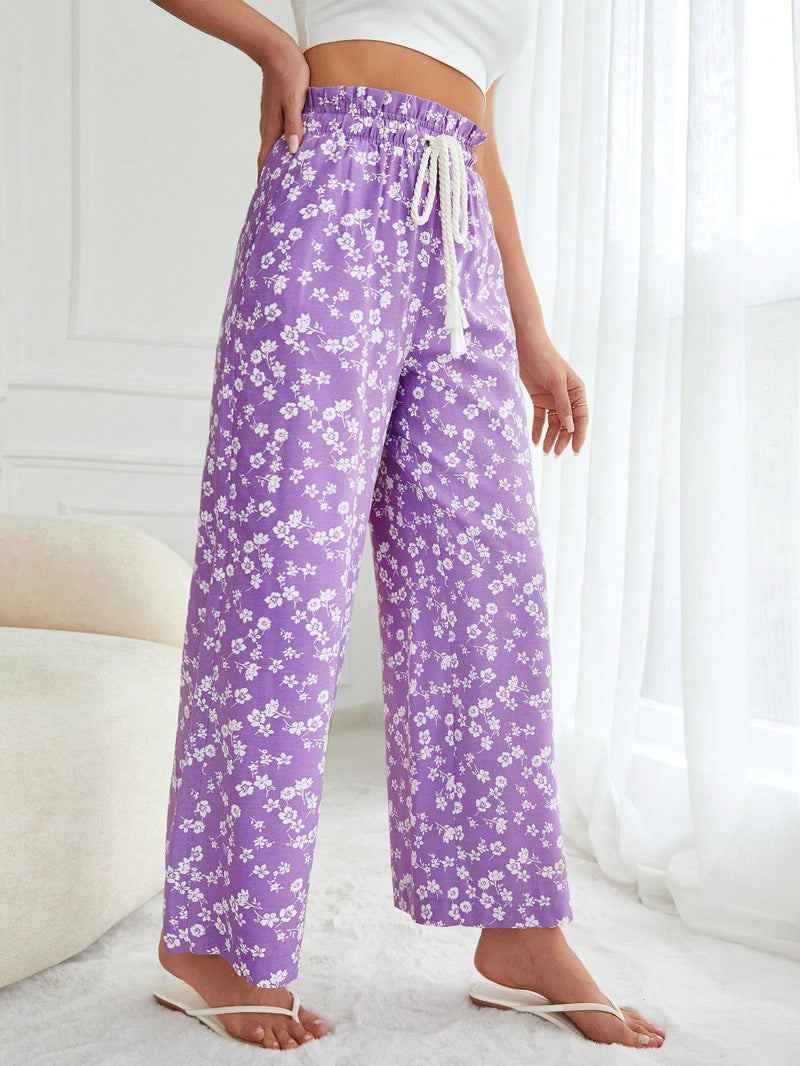 Pantalones largos con cintura con cordon y estampado floral