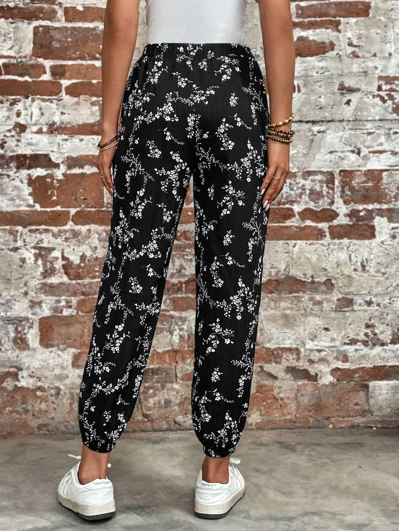 LUNE Pantalones con estampado floral con bolsillo oblicuo