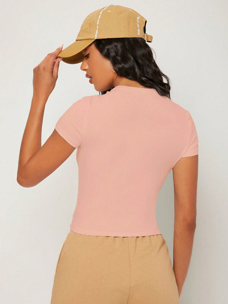 BASICS Camiseta crop unicolor de cuello redondo