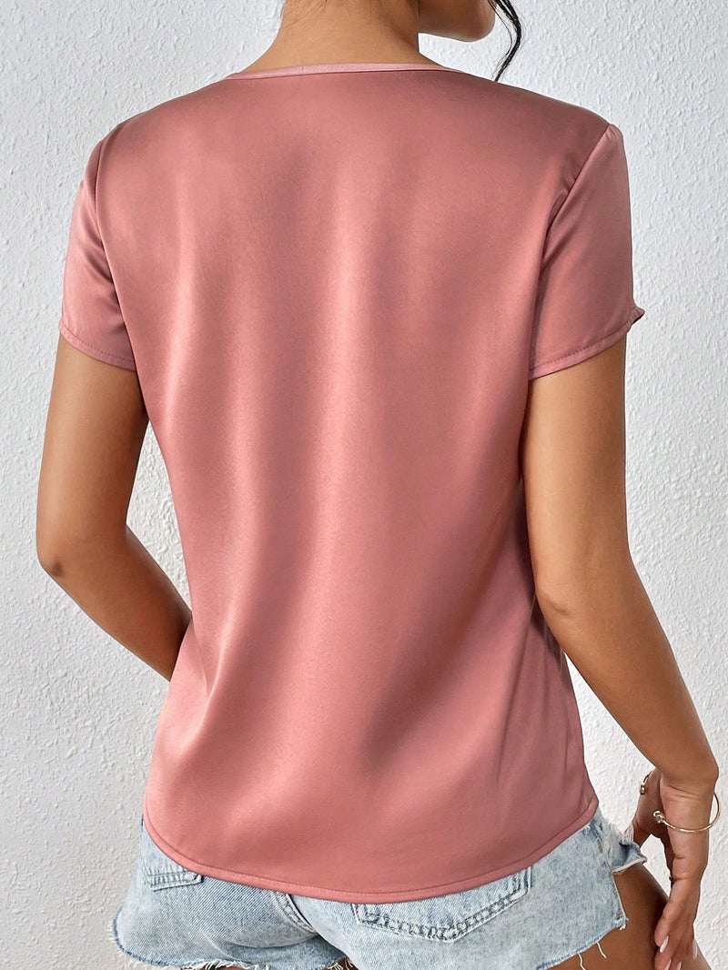 Clasi Blusa unicolor girante delantero