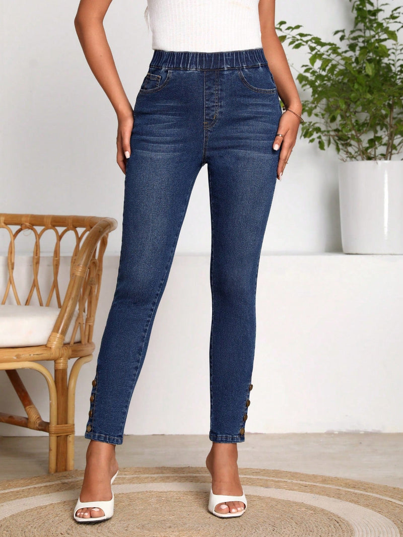 LUNE Jeans ajustados de talle alto con diseno de boton