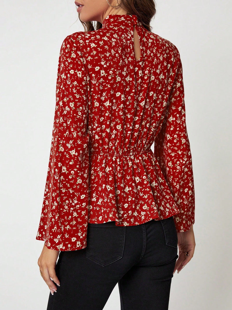 Clasi Blusa peplum con estampado floral de manga con volante