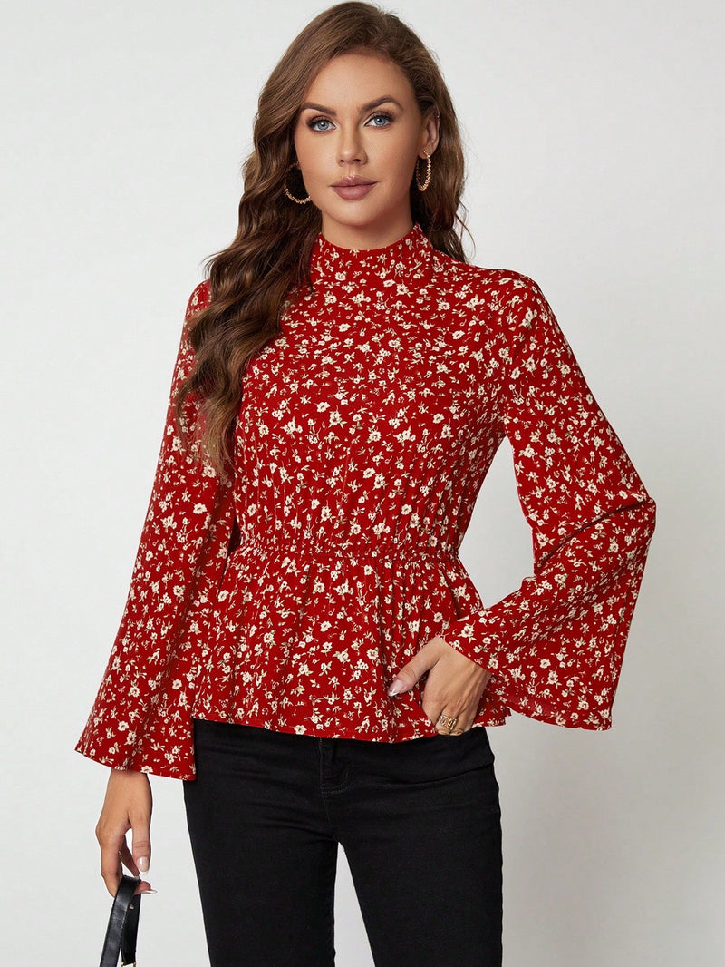 Clasi Blusa peplum con estampado floral de manga con volante