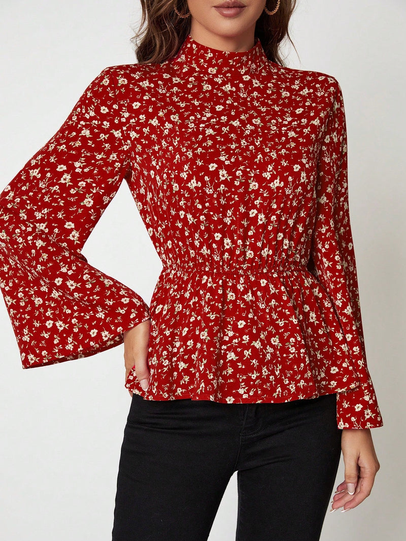 Clasi Blusa peplum con estampado floral de manga con volante