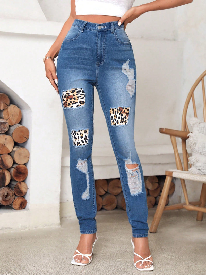 LUNE Jeans ajustados desgarro con estampado de leopardo