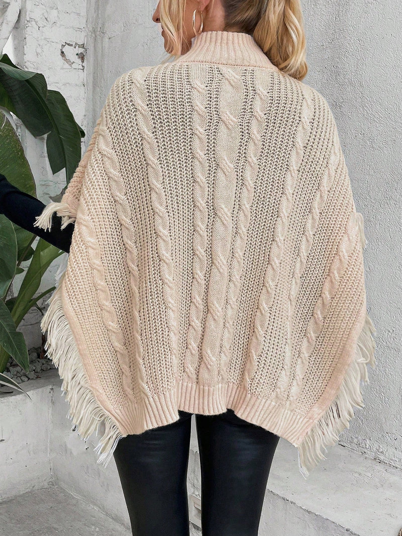 LUNE Poncho cuello alto ribete con fleco tejido de cable