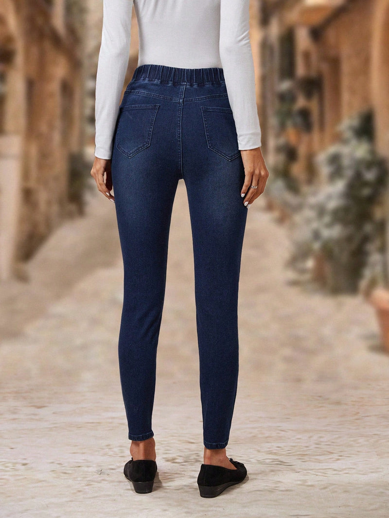 EMERY ROSE Jeans ajustados desgarro de cintura elastica