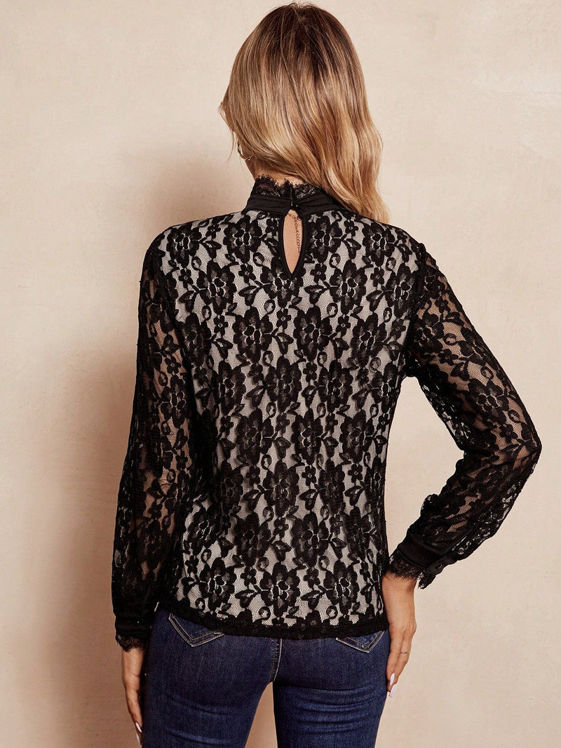 Clasi Blusa de cuello alto con encaje