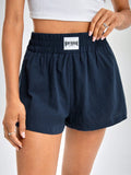 Shorts de pierna ancha con diseno de parche de letra