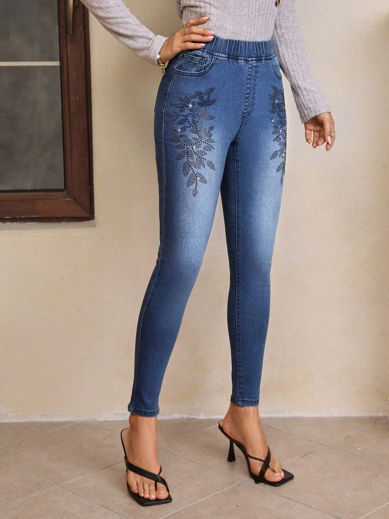 LUNE Jeans ajustados con diamante de imitacion con patron floral