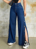 Jeans unicolor con boton lateral