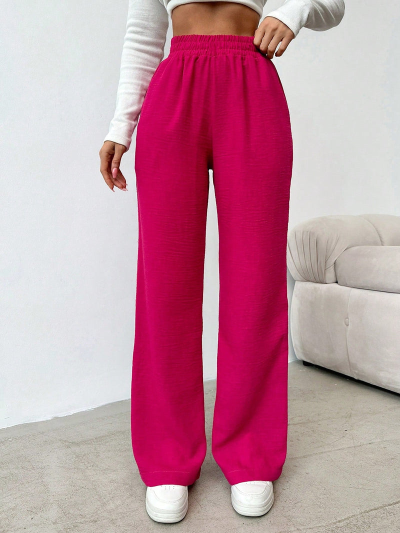 Pantalones sueltos de pierna ancha de color solido para mujer con dobladillo fluido, estilo casual