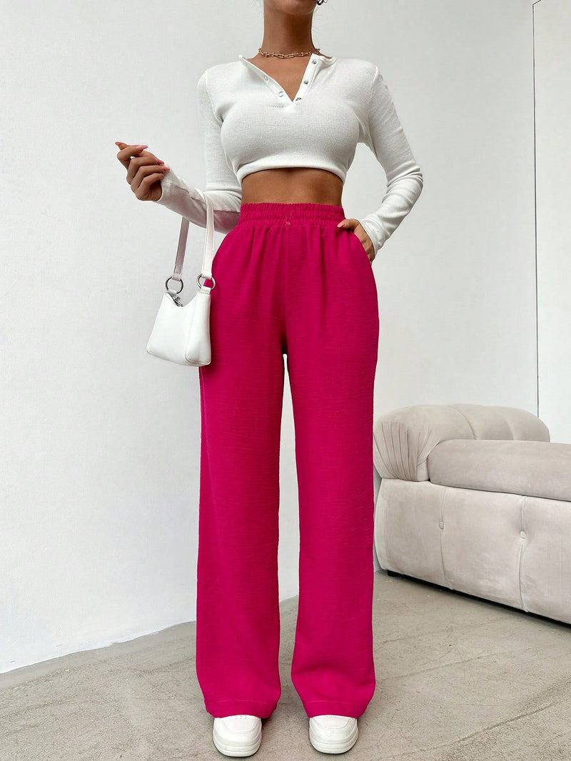 Pantalones sueltos de pierna ancha de color solido para mujer con dobladillo fluido, estilo casual