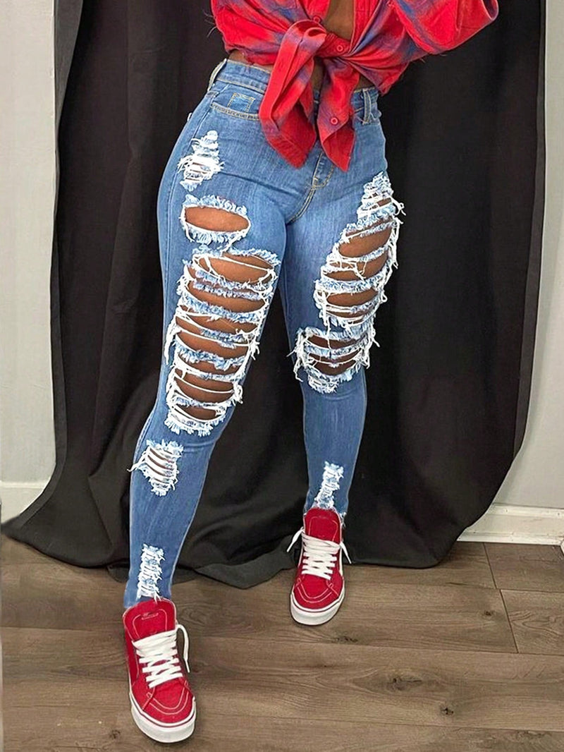 Jeans Ajustados De Estilo Desgastado Y Entallado