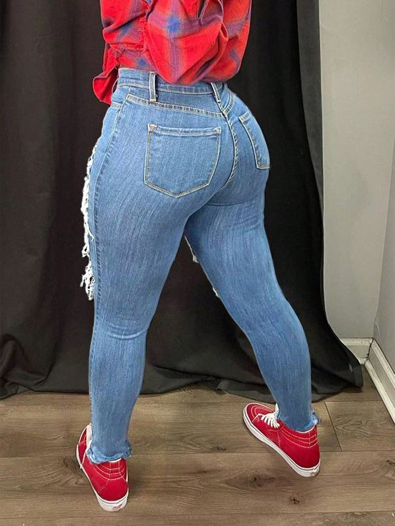 Jeans Ajustados De Estilo Desgastado Y Entallado