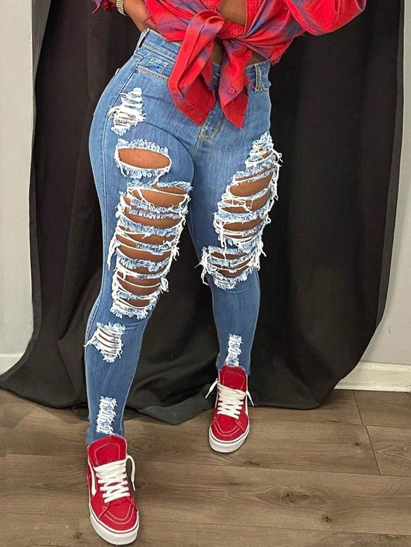 Jeans Ajustados De Estilo Desgastado Y Entallado