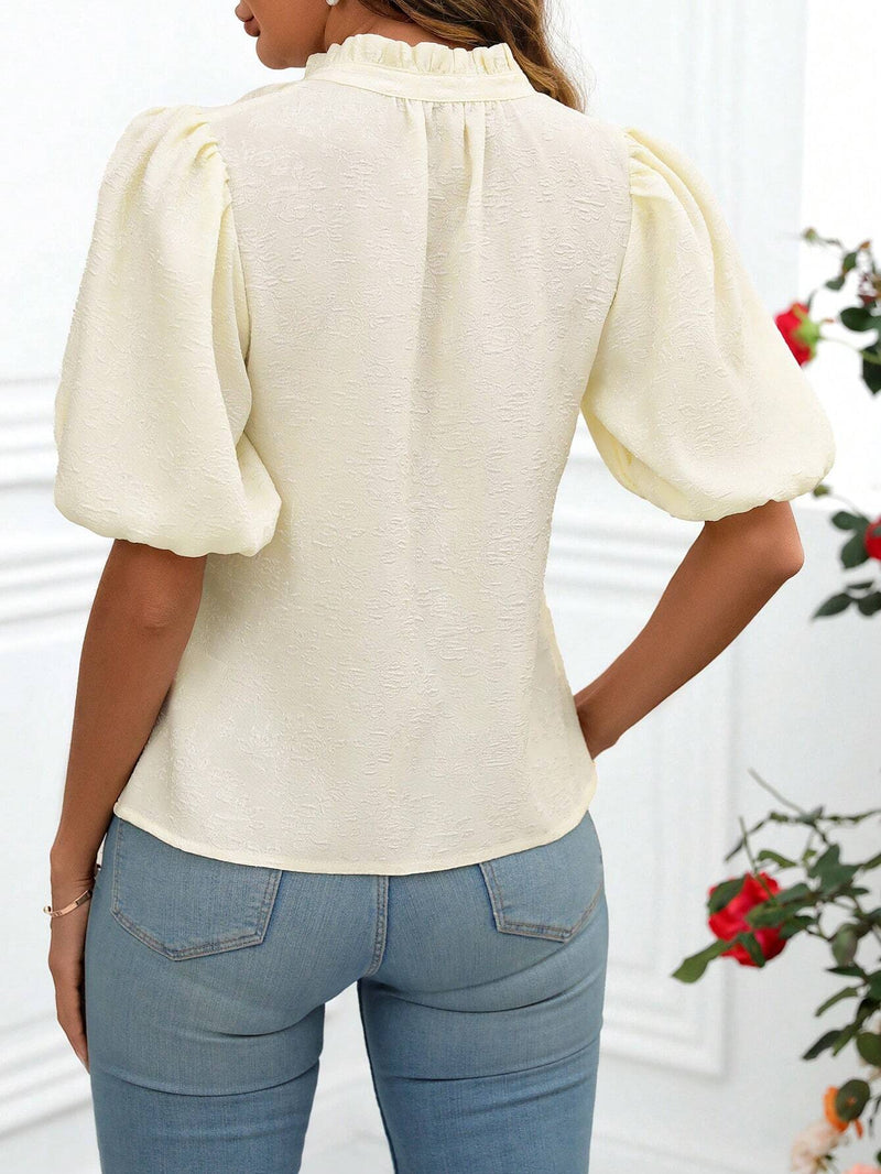 Blusa Jacquard Con Manga Abullonada Y Cuello Con Muesca