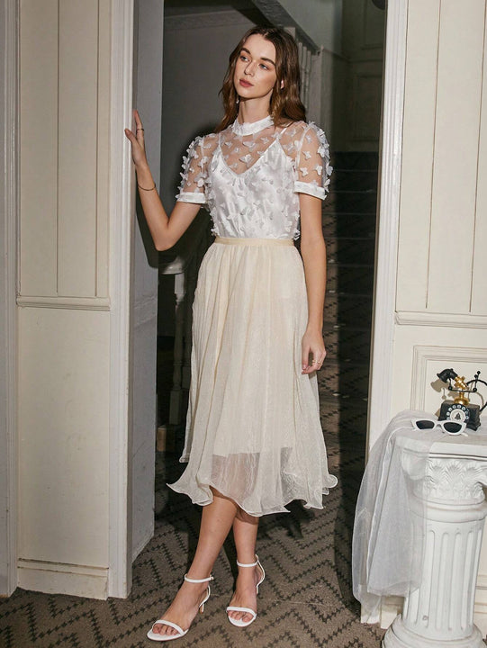 Top Transparente Con Apliques De Mariposa En 3d