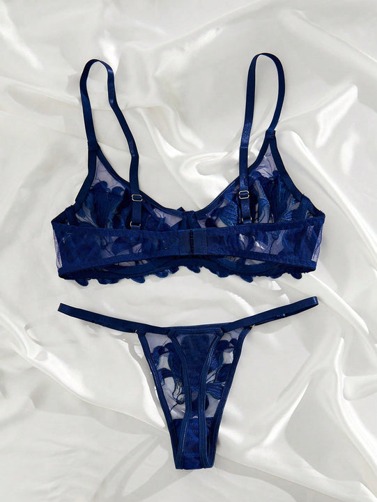 Conjunto de lenceria sexy azul bordado transparente con copa completa