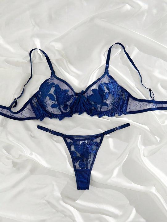 Conjunto de lenceria sexy azul bordado transparente con copa completa