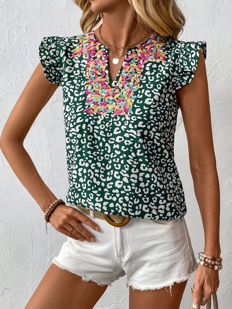 Camisa de mujeres con mangas cortas y volantes estampada para las vacaciones de verano con estilo