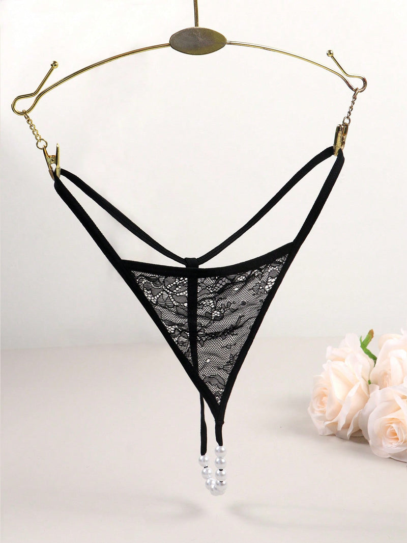 Tanga de mujer con espalda en t, calzoncillos de tiro bajo con cadena de perlas falsas, ropa interior sexy, negro