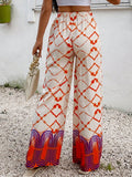 Pantalon de viscosa con estampado tie-dye y estampado colocado, cinturon elastico