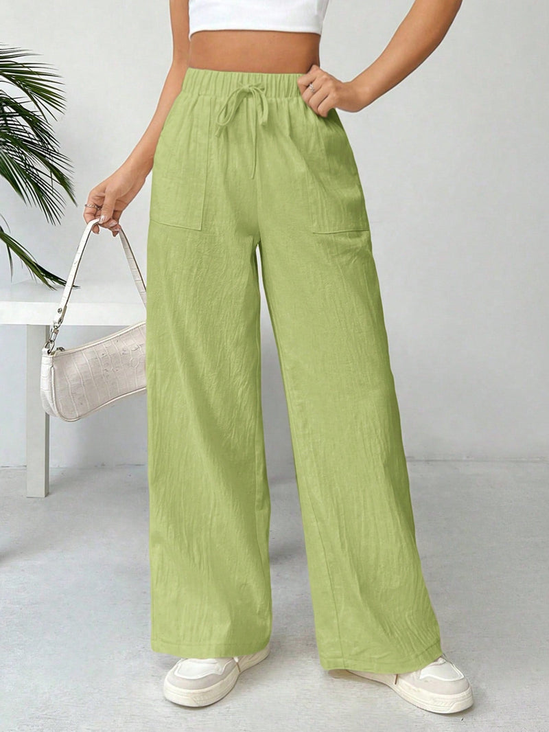 Pantalones sueltos de pierna ancha de color solido para mujer con dobladillo fluido, estilo casual