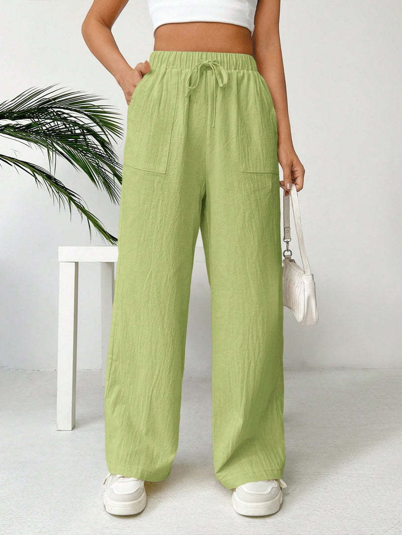 Pantalones sueltos de pierna ancha de color solido para mujer con dobladillo fluido, estilo casual