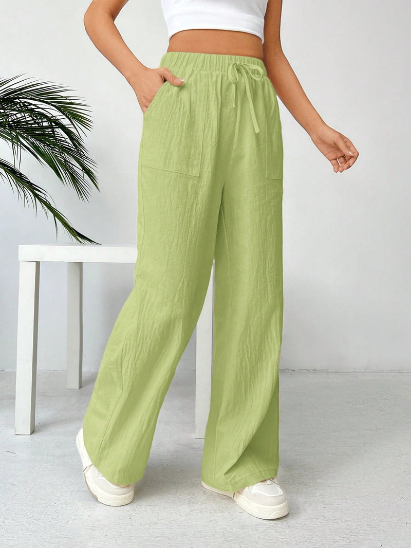 Pantalones sueltos de pierna ancha de color solido para mujer con dobladillo fluido, estilo casual