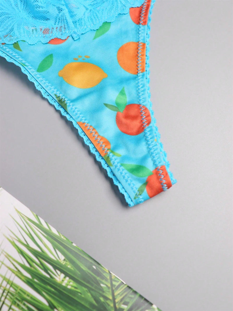 Mujeres, ropa interior sexy y linda, tanga con encaje de contraste y estampado de frutas en color azul